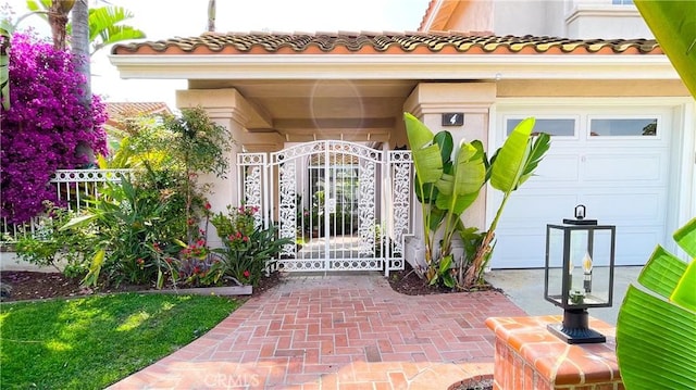 4 Salerno, Irvine, CA 92614 - entrance to property with a gate and a tiled roof