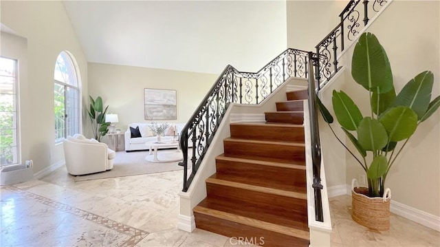 4 Salerno, Irvine, CA 92614 - staircase with marble finish flooring and vaulted ceiling