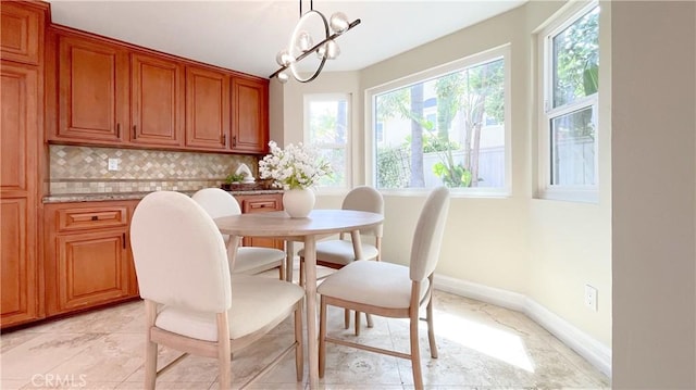 4 Salerno, Irvine, CA 92614 - dining room featuring a chandelier and baseboards