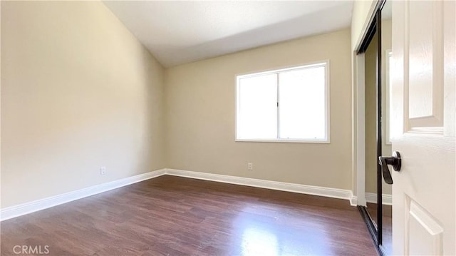 4 Salerno, Irvine, CA 92614 - unfurnished bedroom with dark wood-style flooring and a closet
