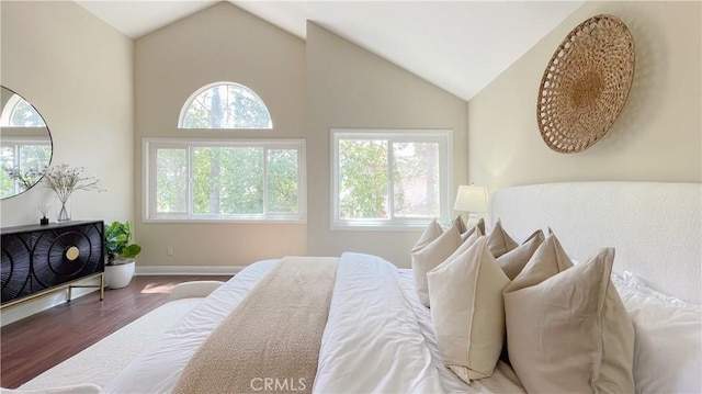 4 Salerno, Irvine, CA 92614 - bedroom featuring wood finished floors, multiple windows, and vaulted ceiling