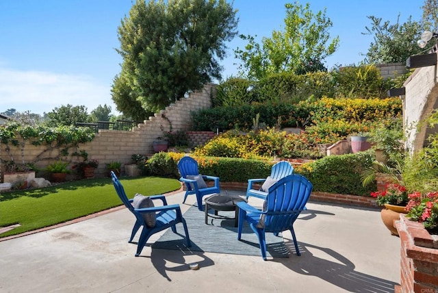 21905 Grovepark Dr, Saugus, CA 91350 - view of patio featuring an outdoor fire pit