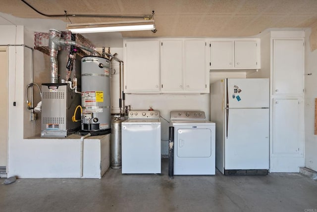 21905 Grovepark Dr, Saugus, CA 91350 - laundry room with water heater, washing machine and clothes dryer, and cabinet space