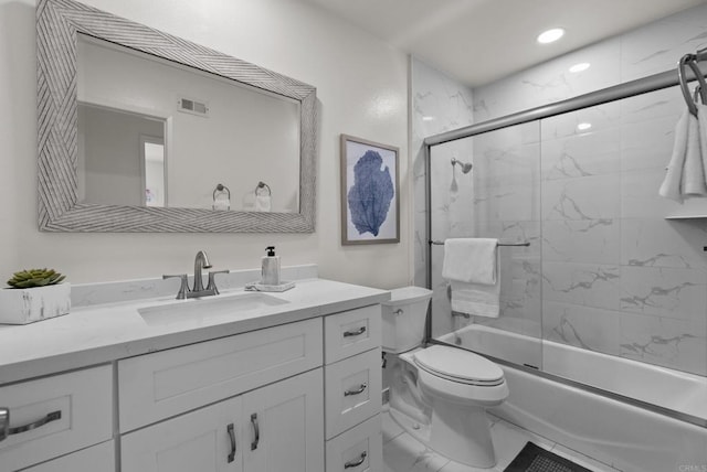 21905 Grovepark Dr, Saugus, CA 91350 - bathroom with vanity, toilet, shower / bath combination with glass door, recessed lighting, and marble look tile flooring
