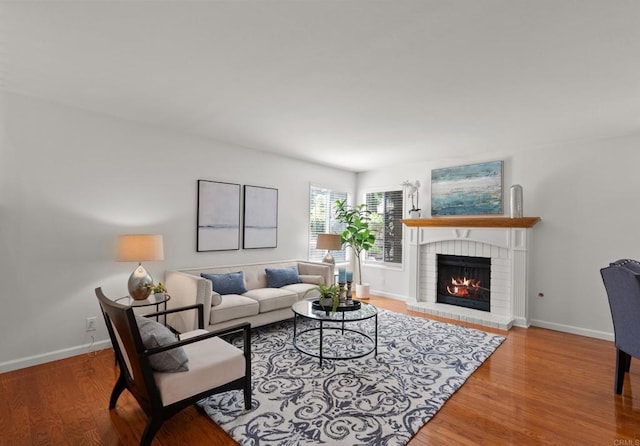 21905 Grovepark Dr, Saugus, CA 91350 - living room with a fireplace and wood finished floors