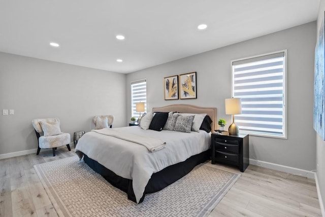 21905 Grovepark Dr, Saugus, CA 91350 - bedroom with light wood-style floors and recessed lighting