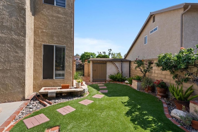 21905 Grovepark Dr, Saugus, CA 91350 - fenced backyard featuring a storage shed