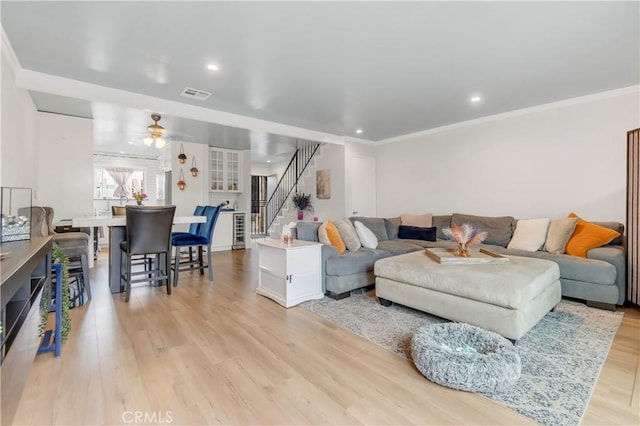534 E Hazel St Unit 5, Inglewood, CA 90302 - living room featuring stairs, ceiling fan, wood finished floors, recessed lighting, and crown molding