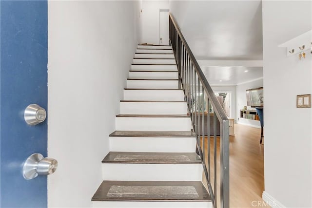 534 E Hazel St Unit 5, Inglewood, CA 90302 - staircase featuring wood finished floors and baseboards