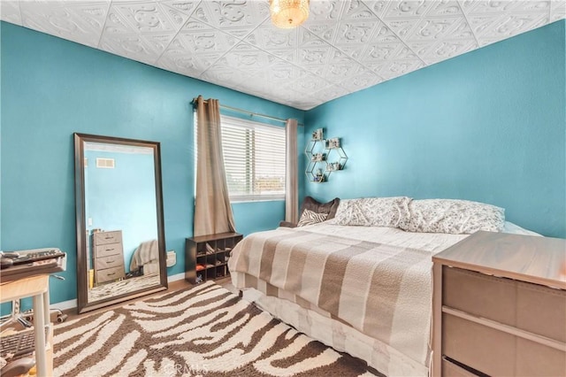 534 E Hazel St Unit 5, Inglewood, CA 90302 - carpeted bedroom with an ornate ceiling and baseboards