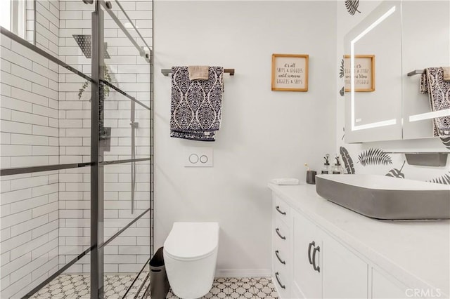 534 E Hazel St Unit 5, Inglewood, CA 90302 - full bathroom with a stall shower, vanity, toilet, and baseboards