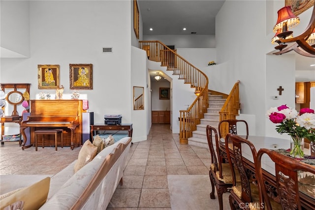 22440 Skylake Pl, Saugus, CA 91390 - living room featuring a towering ceiling and stairway