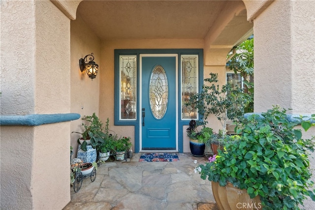 22440 Skylake Pl, Saugus, CA 91390 - view of exterior entry featuring stucco siding