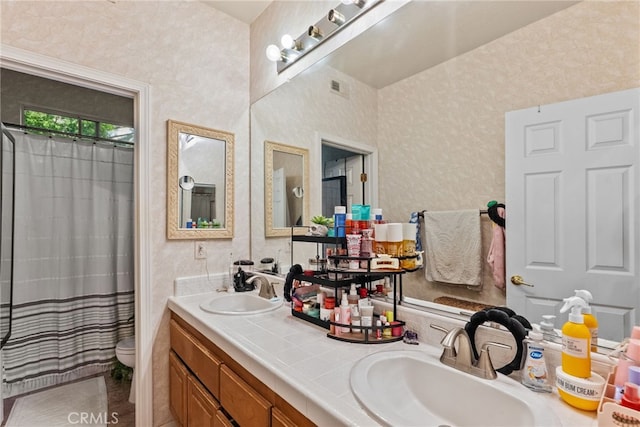 22440 Skylake Pl, Saugus, CA 91390 - bathroom with double vanity and tile patterned floors