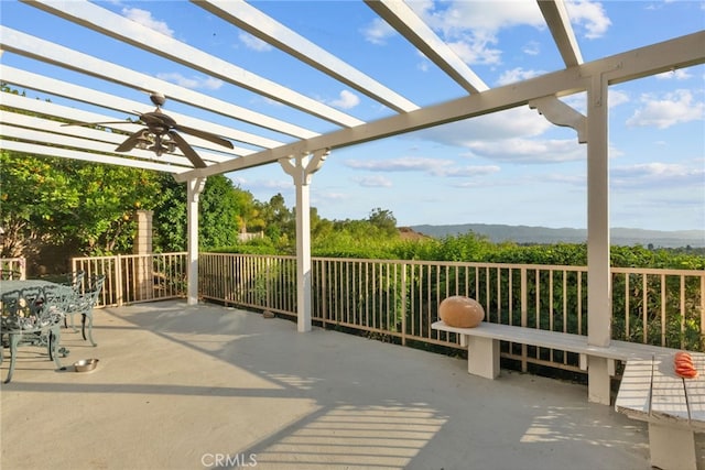 22440 Skylake Pl, Saugus, CA 91390 - view of patio with a pergola, a ceiling fan, and a mountain view