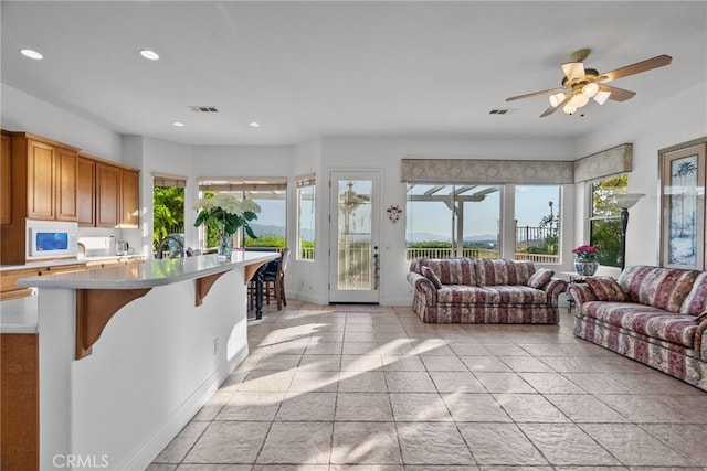 22440 Skylake Pl, Saugus, CA 91390 - living room featuring recessed lighting, ceiling fan, and baseboards