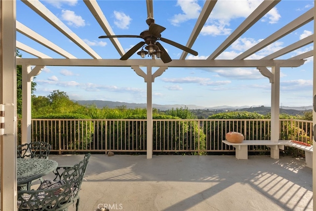 22440 Skylake Pl, Saugus, CA 91390 - view of patio / terrace featuring a pergola, a mountain view, and ceiling fan