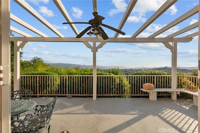22440 Skylake Pl, Saugus, CA 91390 - view of patio / terrace featuring a pergola, a mountain view, and a ceiling fan