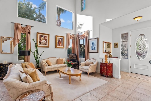 22440 Skylake Pl, Saugus, CA 91390 - entrance foyer with light tile patterned flooring, a high ceiling, and baseboards