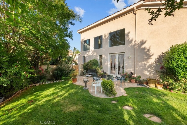 22440 Skylake Pl, Saugus, CA 91390 - rear view of property with stucco siding, french doors, a patio area, and a tiled roof