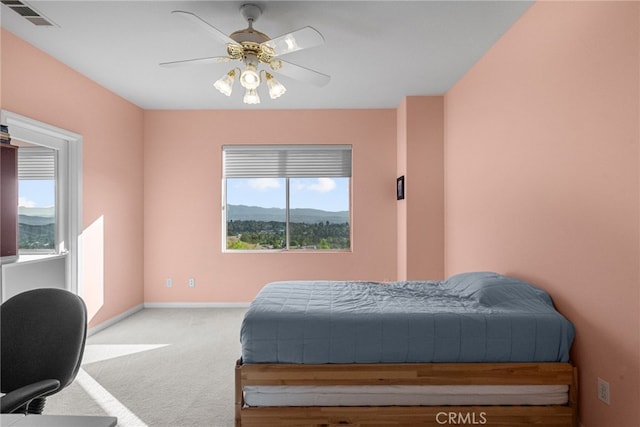 22440 Skylake Pl, Saugus, CA 91390 - bedroom featuring multiple windows, carpet floors, baseboards, and ceiling fan