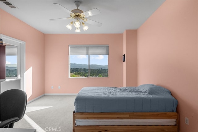 22440 Skylake Pl, Saugus, CA 91390 - bedroom featuring multiple windows, carpet, a ceiling fan, and a desk