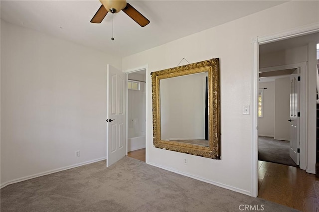 26350 Spyglass Dr, Lake Arrowhead, CA 92352 - unfurnished bedroom with carpet floors, baseboards, and ceiling fan