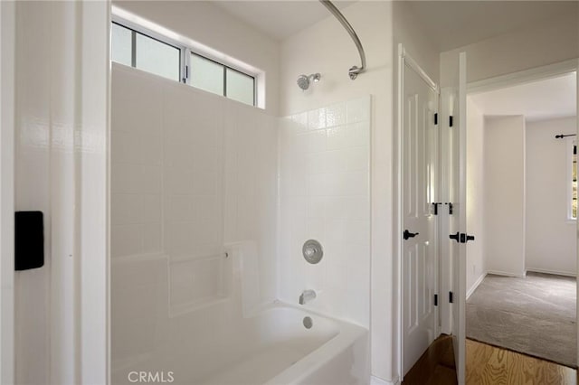 26350 Spyglass Dr, Lake Arrowhead, CA 92352 - bathroom featuring washtub / shower combination and wood finished floors