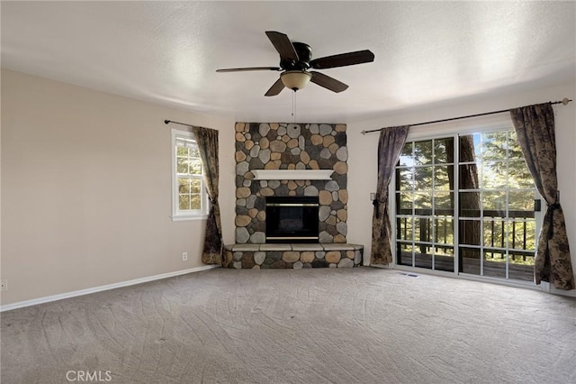 26350 Spyglass Dr, Lake Arrowhead, CA 92352 - unfurnished living room with a ceiling fan, carpet, a fireplace, and baseboards