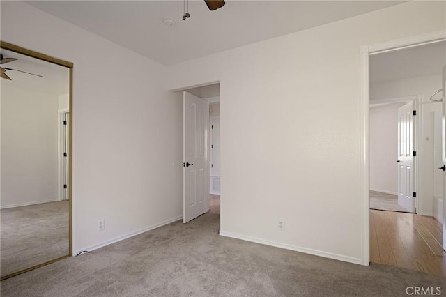 26350 Spyglass Dr, Lake Arrowhead, CA 92352 - unfurnished bedroom featuring carpet flooring, baseboards, and ceiling fan