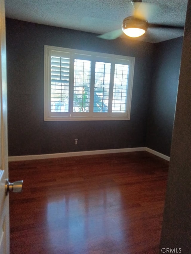 16614 Samgerry Dr, La Puente, CA 91744 - empty room with a ceiling fan, dark wood finished floors, and a textured ceiling