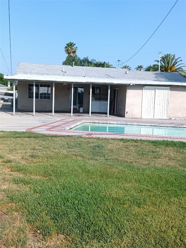 16614 Samgerry Dr, La Puente, CA 91744 - back of property with a patio, a yard, stucco siding, and a jacuzzi