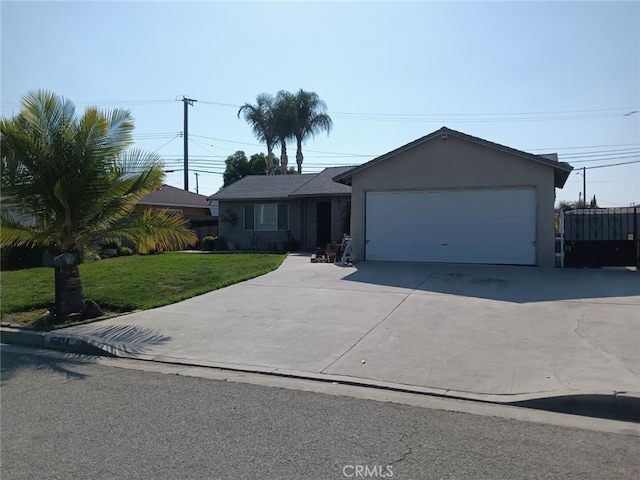 16614 Samgerry Dr, La Puente, CA 91744 - single story home featuring a front yard, stucco siding, driveway, and a garage