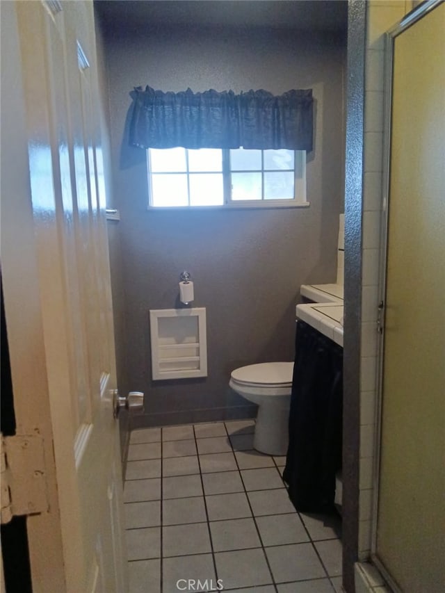 16614 Samgerry Dr, La Puente, CA 91744 - bathroom featuring tile patterned flooring, a shower stall, and vanity