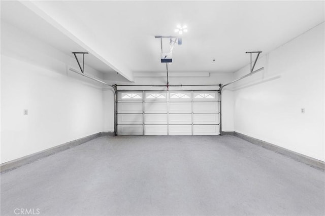 338 Laurel Ave, Arcadia, CA 91006 - garage featuring baseboards and a garage door opener