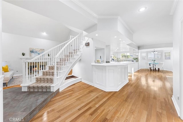 338 Laurel Ave, Arcadia, CA 91006 - interior space featuring light wood-style flooring, stairway, crown molding, baseboards, and recessed lighting