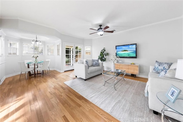 338 Laurel Ave, Arcadia, CA 91006 - living room with a chandelier, light wood finished floors, baseboards, a ceiling fan, and ornamental molding