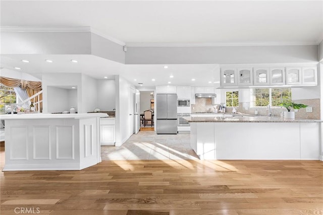 338 Laurel Ave, Arcadia, CA 91006 - kitchen with built in appliances, white cabinets, light wood-style floors, ornamental molding, and recessed lighting