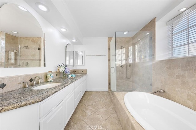 338 Laurel Ave, Arcadia, CA 91006 - full bath featuring a bath, a stall shower, double vanity, recessed lighting, and tile patterned flooring