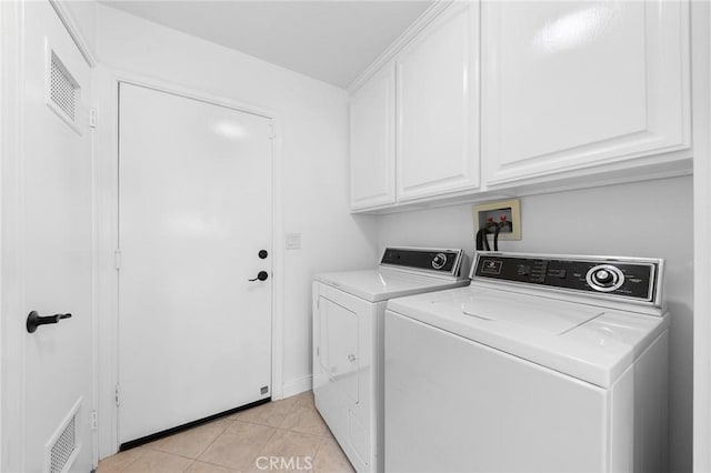 338 Laurel Ave, Arcadia, CA 91006 - washroom featuring cabinet space, washer and clothes dryer, and light tile patterned floors