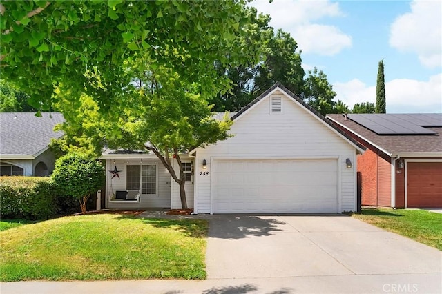 258 Vail Dr, Chico, CA 95973 - view of front of property with an attached garage, driveway, and a front lawn