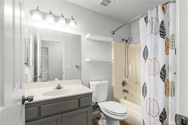 258 Vail Dr, Chico, CA 95973 - bathroom with shower / bath combination with curtain, vanity, and toilet