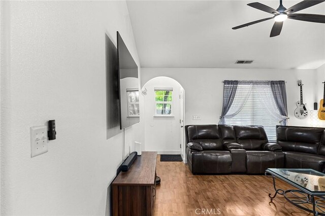 258 Vail Dr, Chico, CA 95973 - living area with a ceiling fan, arched walkways, and wood finished floors