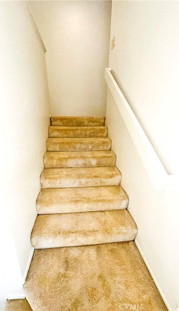 23878 Bouquet Canyon Pl, Moreno Valley, CA 92557 - stairs featuring carpet floors
