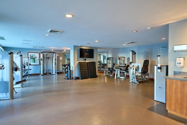 325 7th Unit 1501, San Diego, CA 92101 - workout area featuring recessed lighting, baseboards, and an AC wall unit