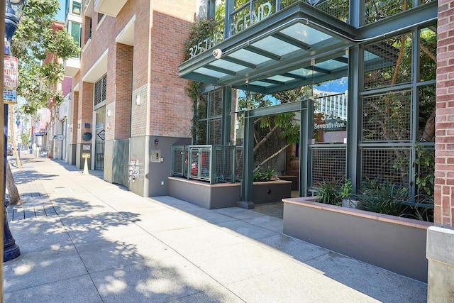 325 7th Unit 1501, San Diego, CA 92101 - property entrance with brick siding and a gate