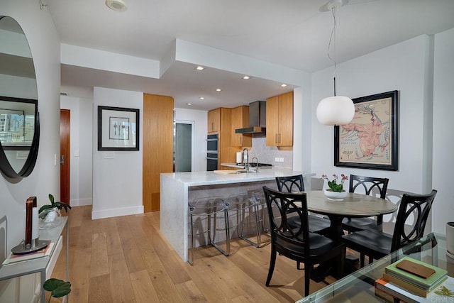 325 7th Unit 1501, San Diego, CA 92101 - dining space featuring light wood finished floors, baseboards, and recessed lighting