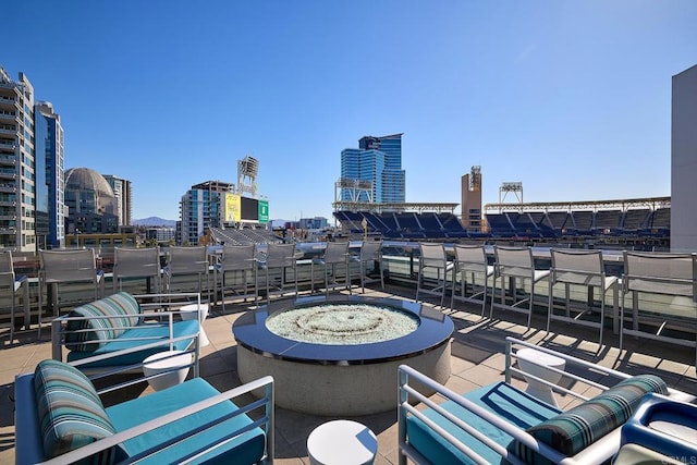325 7th Unit 1501, San Diego, CA 92101 - view of patio / terrace featuring a fire pit and a city view
