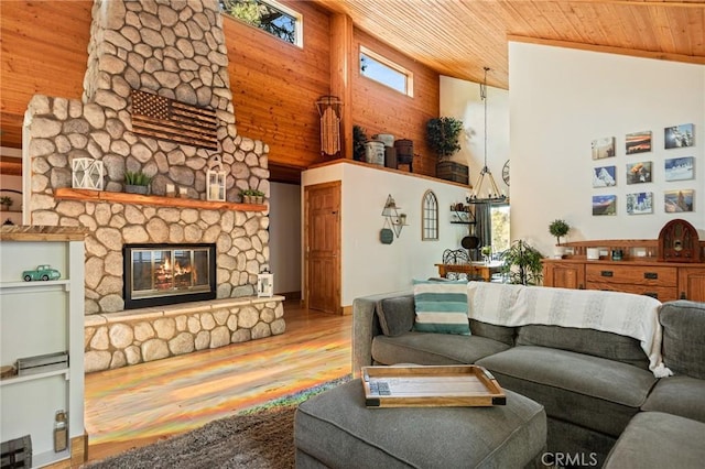 31297 All View Dr, Running Springs, CA 92382 - living room featuring a high ceiling, wooden ceiling, wood finished floors, and a fireplace