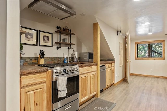 31297 All View Dr, Running Springs, CA 92382 - kitchen with appliances with stainless steel finishes, light wood-style floors, light brown cabinets, ventilation hood, and dark countertops
